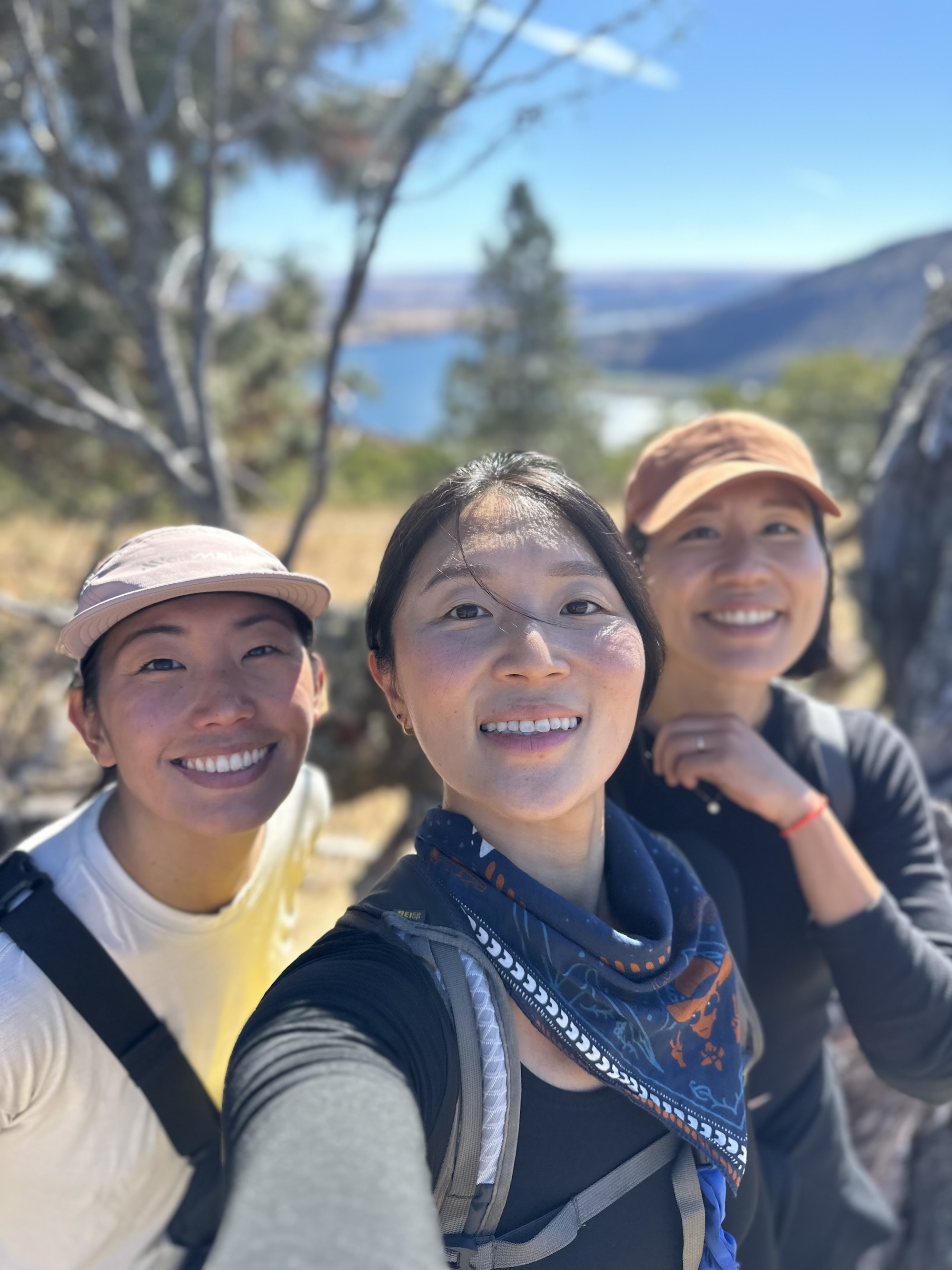 Three women hiking in Lyle Cherry Orchard Trail 